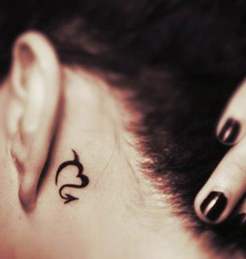 Tiny Scorpio Symbol Tattoo On Behind Ear For Woman