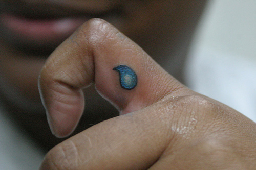 Tiny Water Drop Tattoo On Finger