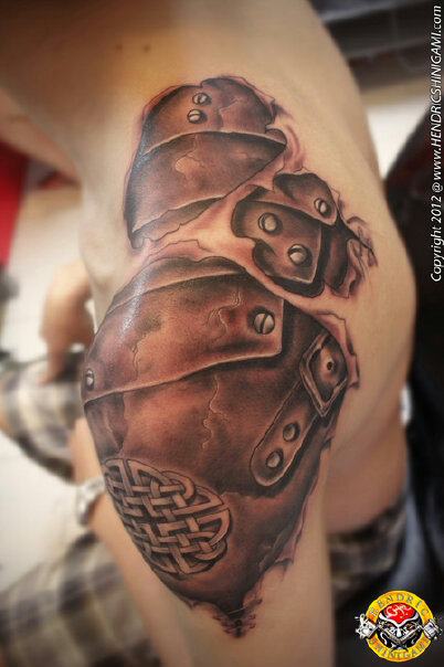 Torn Skin Celtic Armor Tattoo For Men