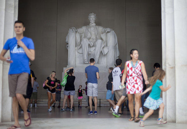 Tourists Are Seen At The Lincoln Memorial Inside View