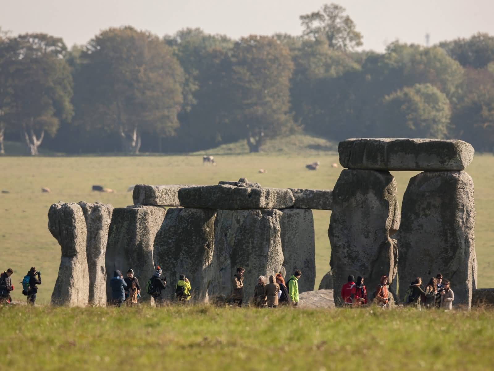 Tourists Enjoying The View Of Stonehenge Monument