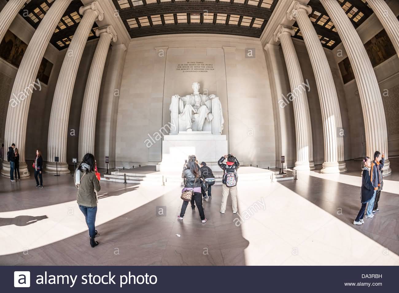 Tourists Visits The Abraham Lincoln Statue At The Lincoln Memorial