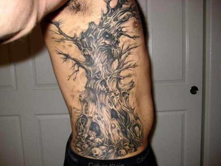 Tree Of Ghosts Tattoo On Rib Cage For Men