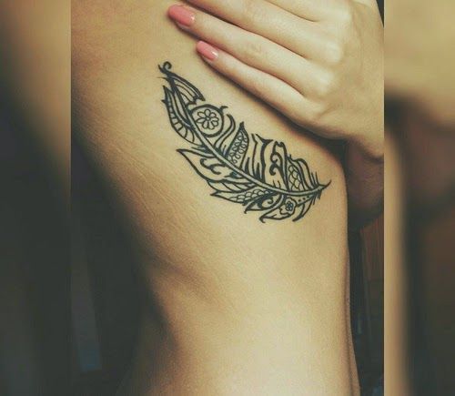 Tribal Feather Tattoo On Right Rib Cage