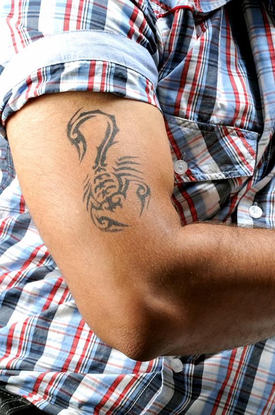 Tribal Scorpio Tattoo On Half Sleeve