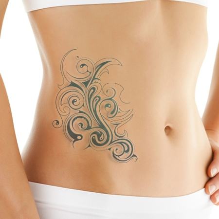Tribal Water Tattoo On Hip For Girls
