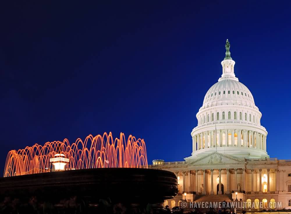 United States Capitol And Fountain At Night
