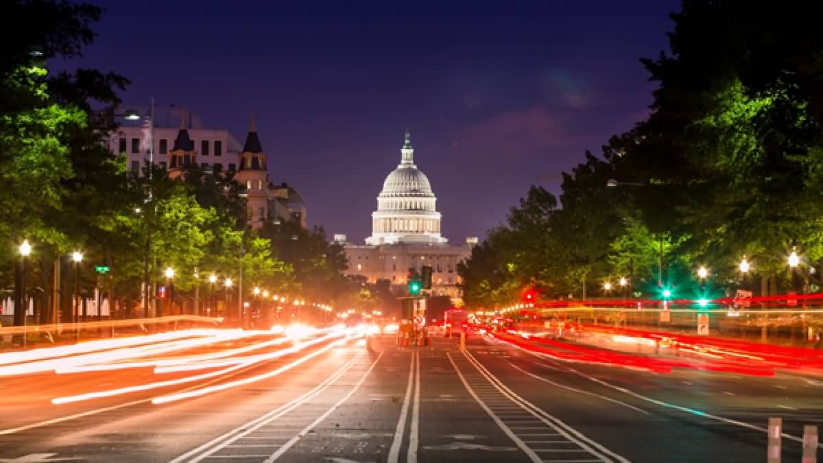 United States Capitol Building And Traffic Motion Lights At Night