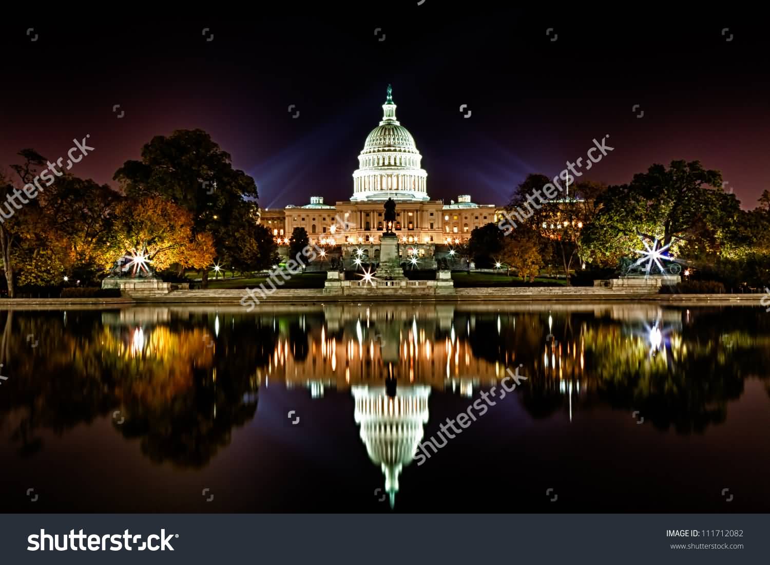 United States Capitol Reflection In Water At Night