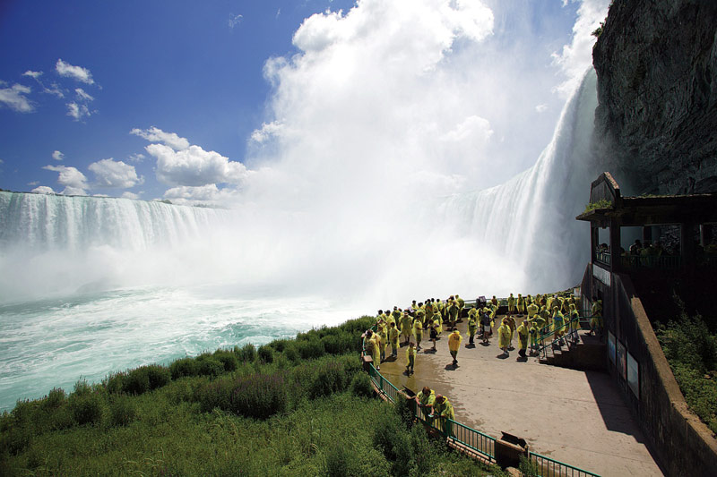 Visitors Enjoying The Sightseeing Of The Niagara Falls