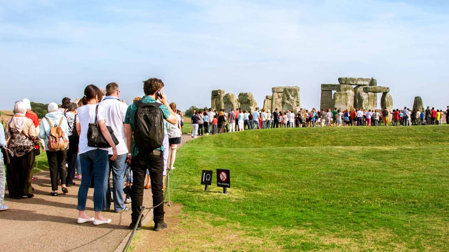 Visitors In Queue To Watch Stonehenge Monument