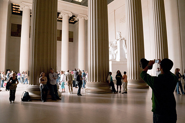 Visitors Inside The Lincoln Memorial