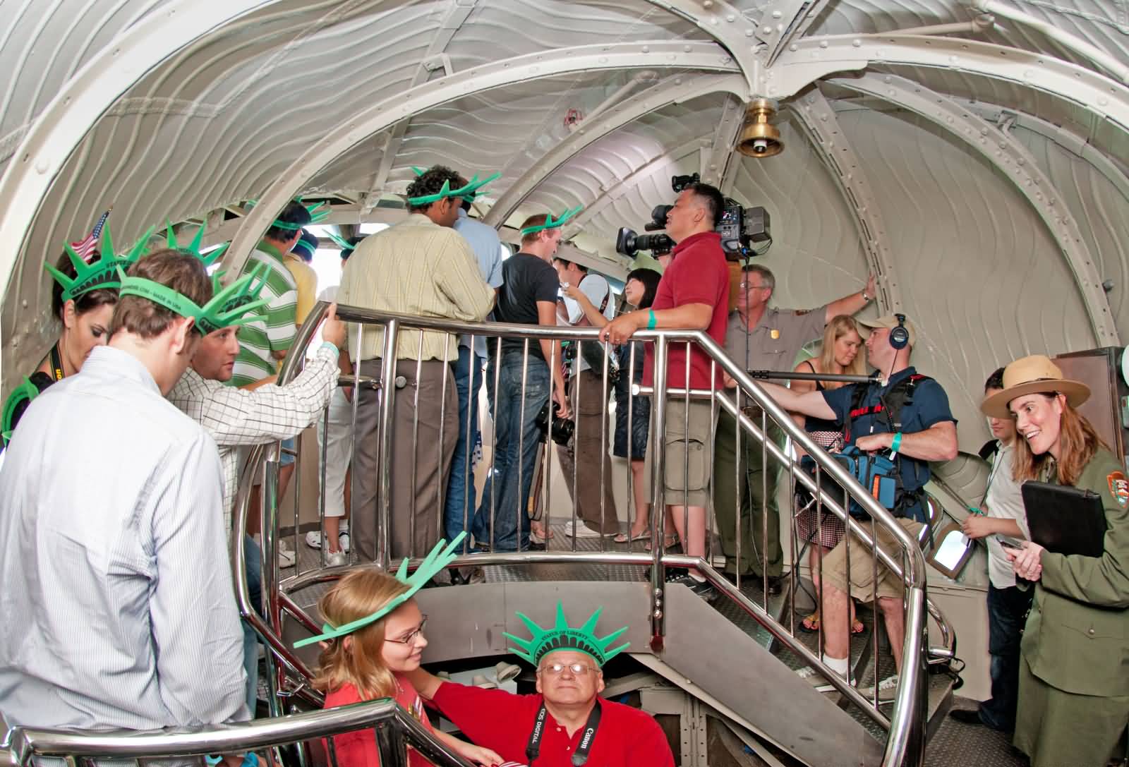Visitors Inside The Statue Of Liberty