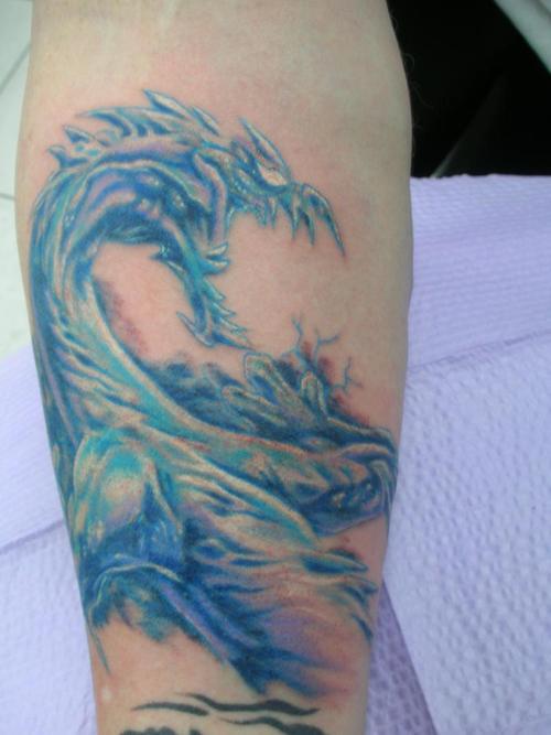 Water Dragon Tattoo On Forearm