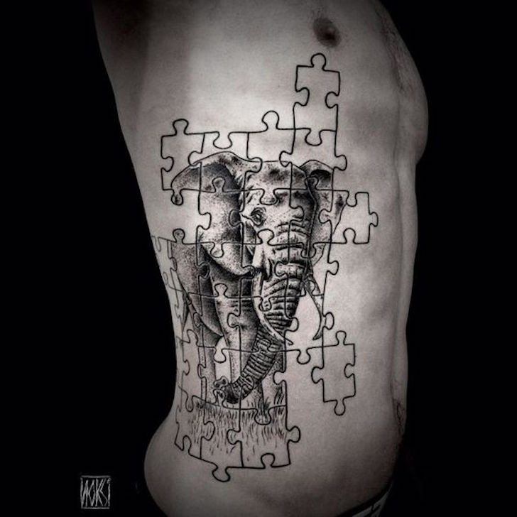 Wonderful Elephant Puzzle Tattoo On Side Rib For Men