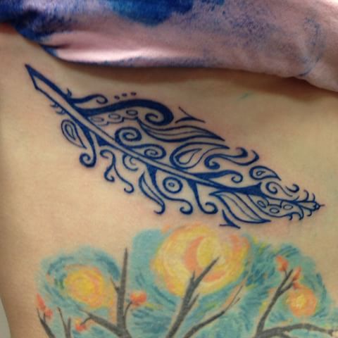 Wonderful Feather Tattoo On Rib Cage