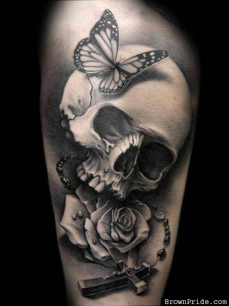 3D Butterfly On Skull With Rose And Rosary Tattoo