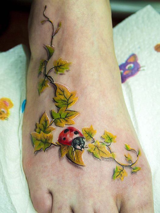 Amazing 3D Ladybug On Ivy Vine Foot Tattoo