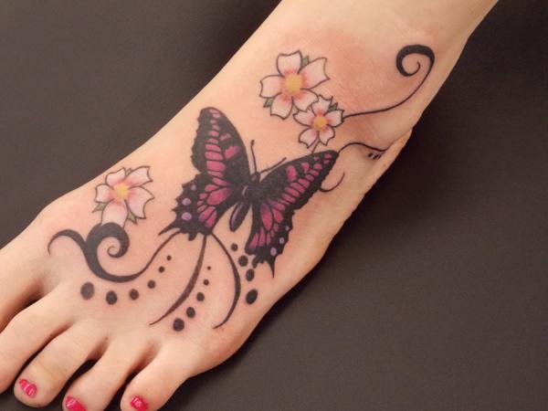 Amazing Butterfly With Flowers Tattoo On Foot