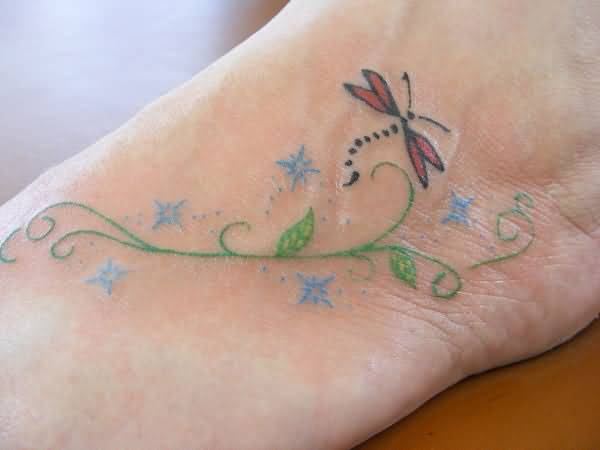 Amazing Green Vine And Blue Stars Dragonfly Tattoo On Foot