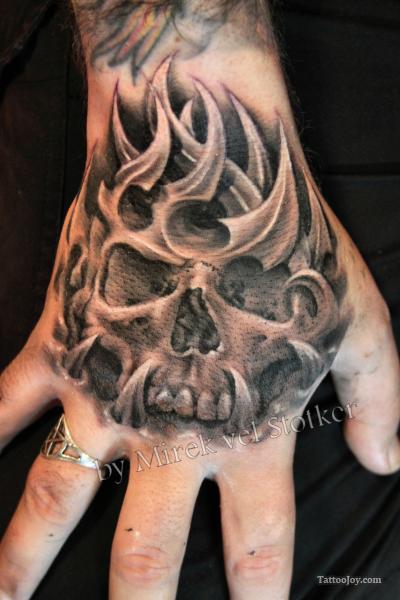 Amazing Grey Ink Tribal Skull Hand Tattoo For Men