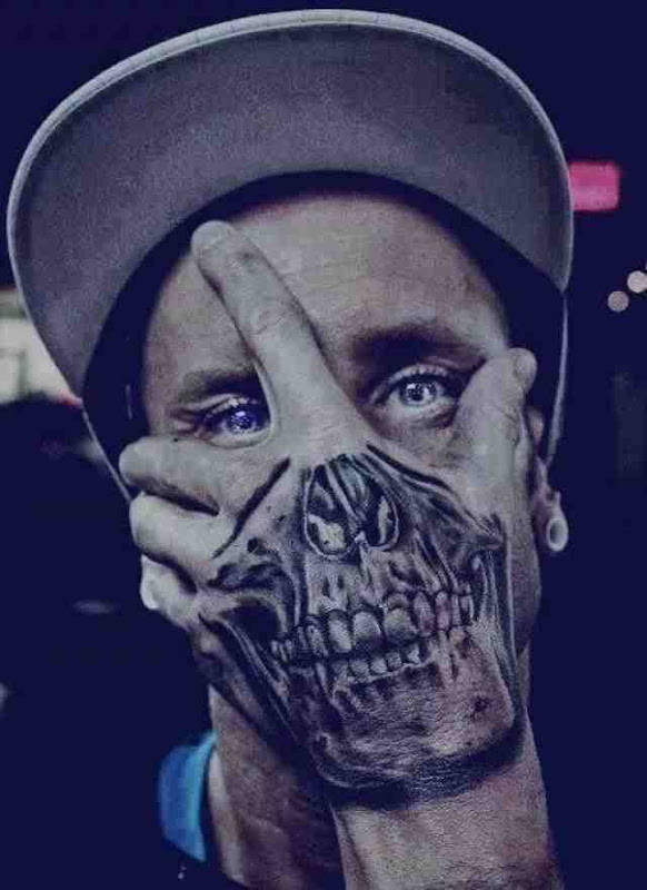 Amazing Skull Hand Tattoo For Men