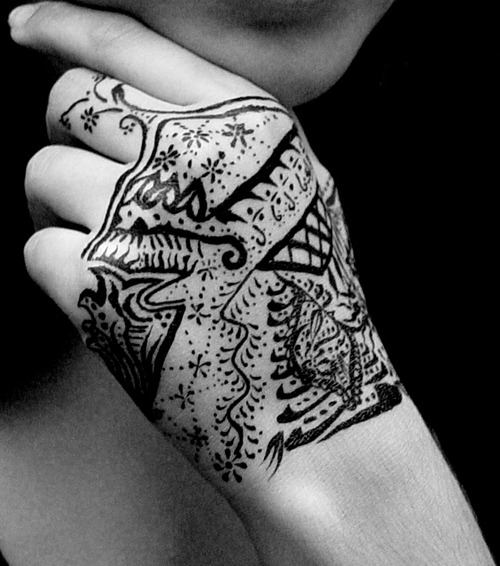 Amazing Tribal Hand Tattoo