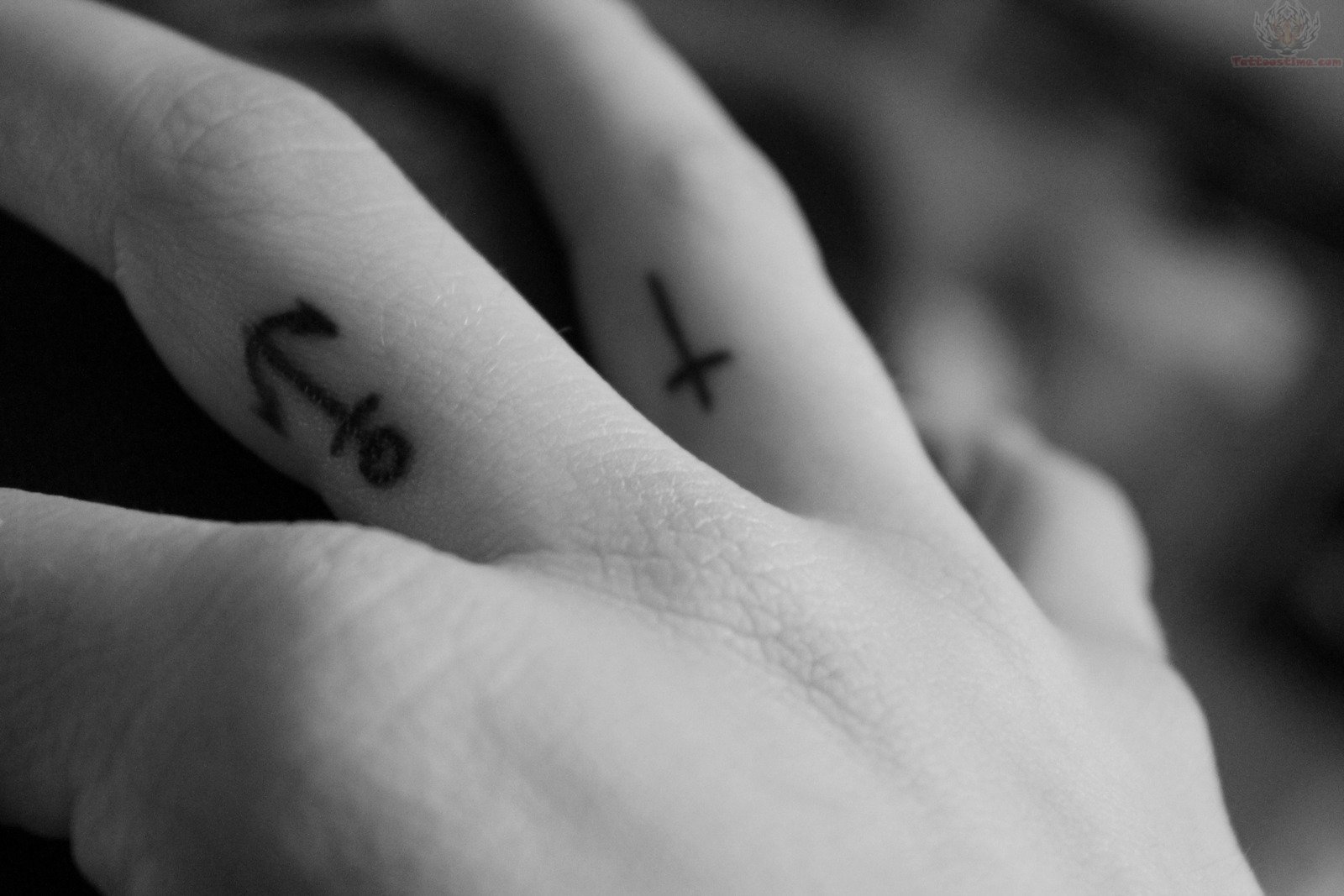 Anchor And Cross Tattoos On Side Fingers