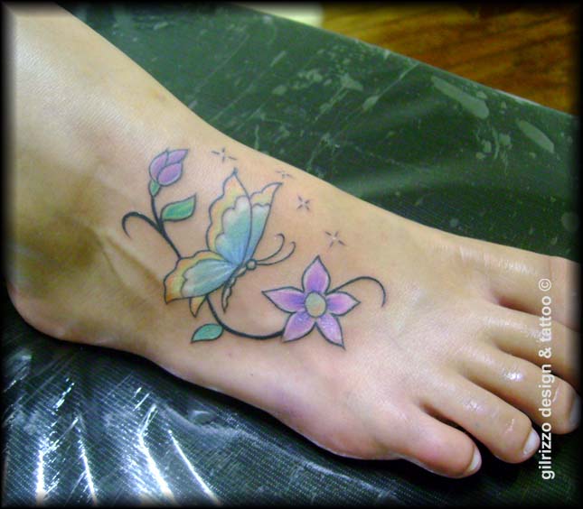 Attractive Butterfly And Flowers Tattoo On Right Foot
