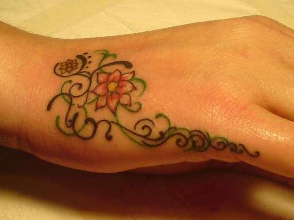 Attractive Floral Side Hand Tattoo