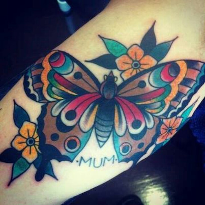 Attractive Traditional Butterfly Tattoo On Biceps