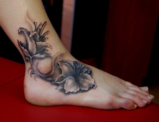 Awesome 3D Black Flowers Tattoo On Ankle And Foot
