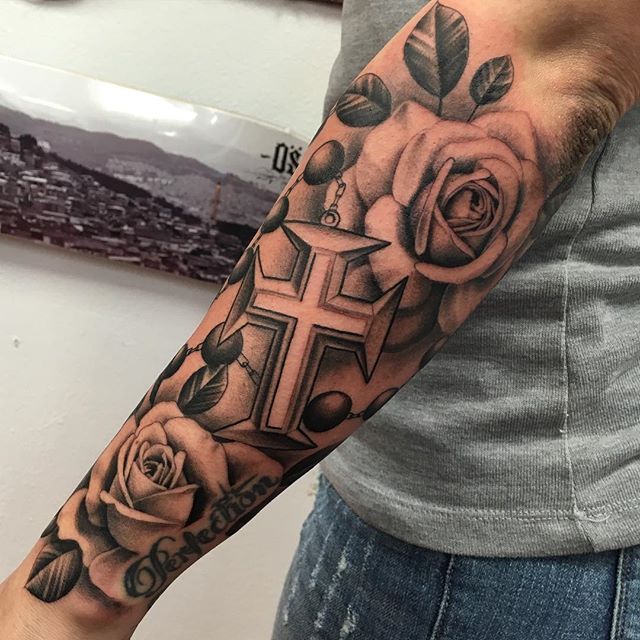 Awesome Big Rosary And Roses Tattoo On Arm Sleeve