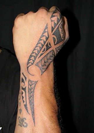 Awesome Black Ink Tribal Hand Tattoo