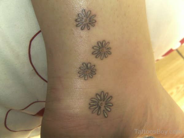 Awesome Daisy Flowers Ankle Tattoo For Girls