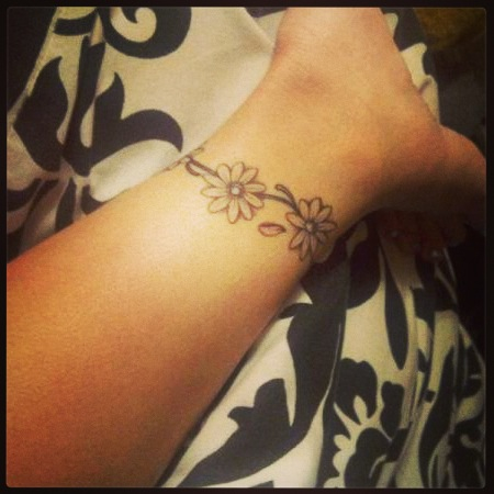 Awesome Daisy Flowers Tattoo On Ankle For Girls