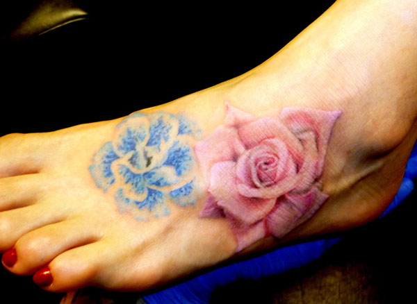 Awesome Flowers Tattoo On Foot For Women