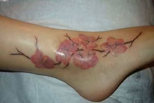 Awesome Flowers Vine Tattoo On Foot And Ankle