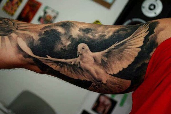 Awesome Flying Dove Tattoo On Inner Bicep
