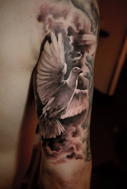Awesome Flying  Dove Tattoo On Sleeve
