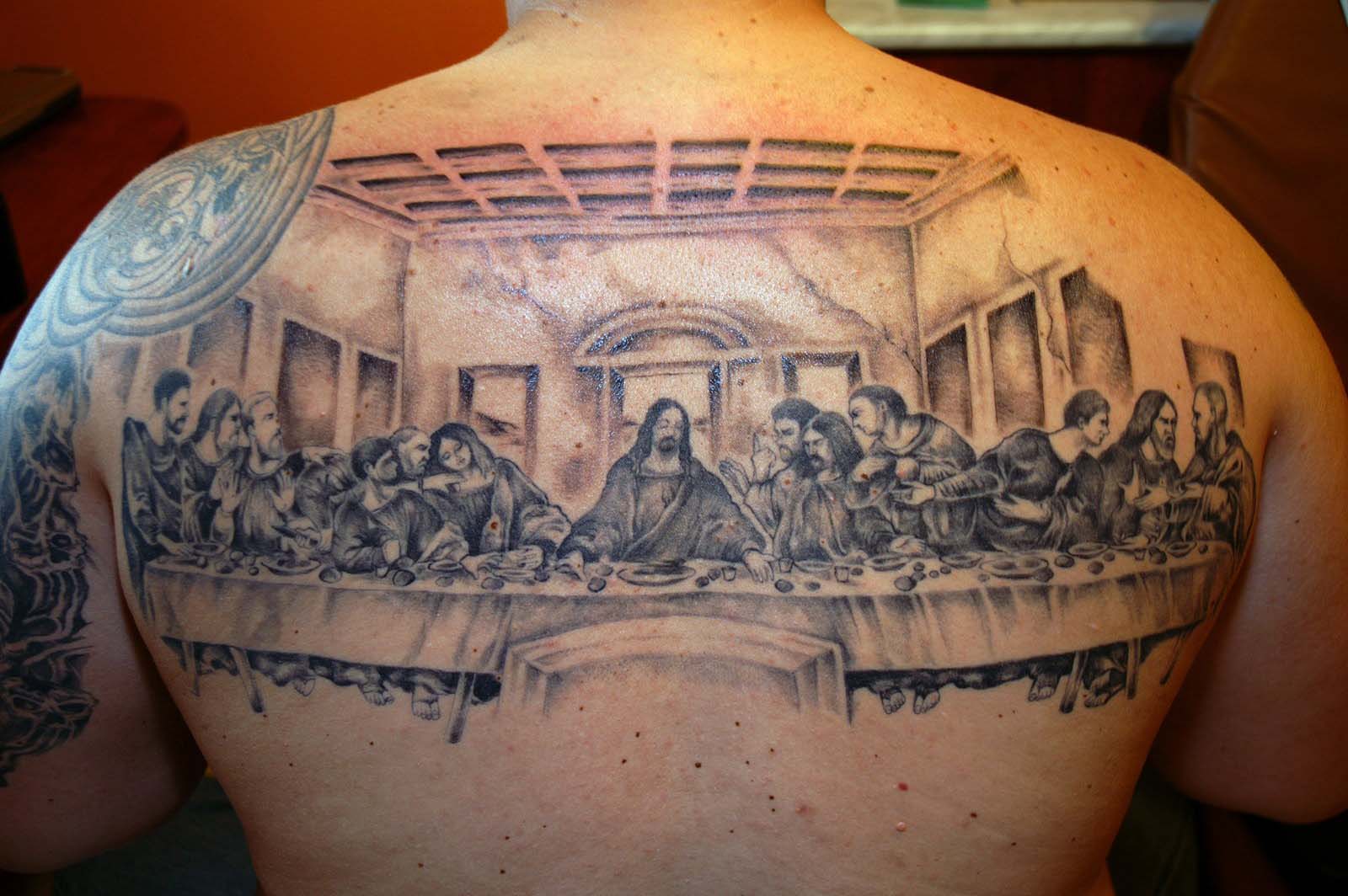 Awesome Grey Ink Christian Portrait Tattoo On Upper Back