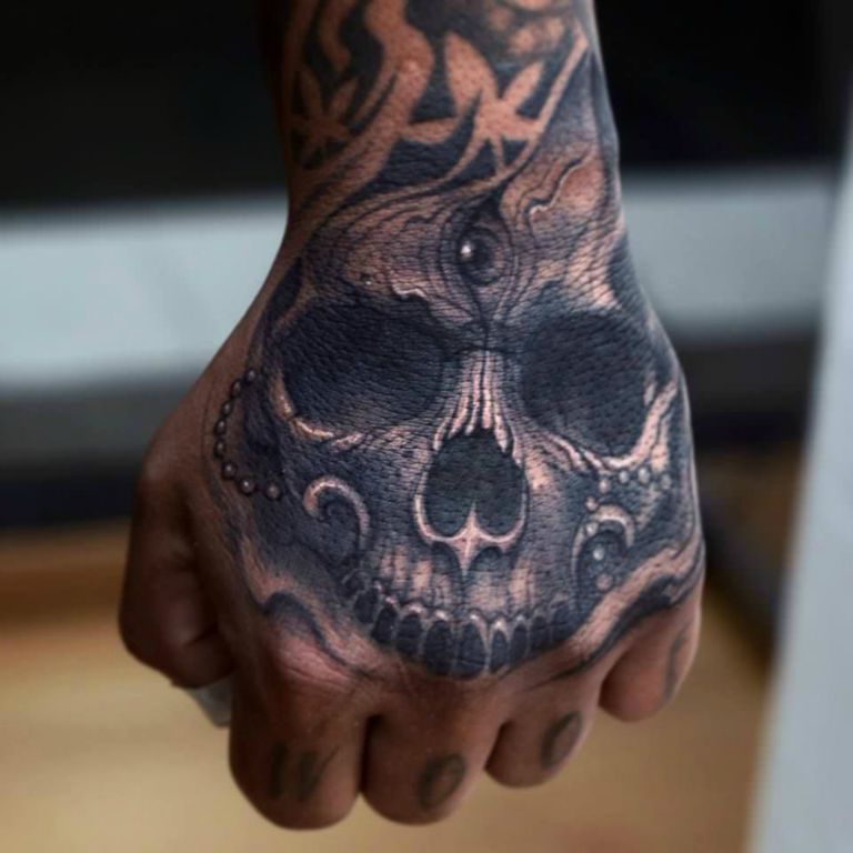 Awesome Hand Skull With Eye Tattoo On Man Hand