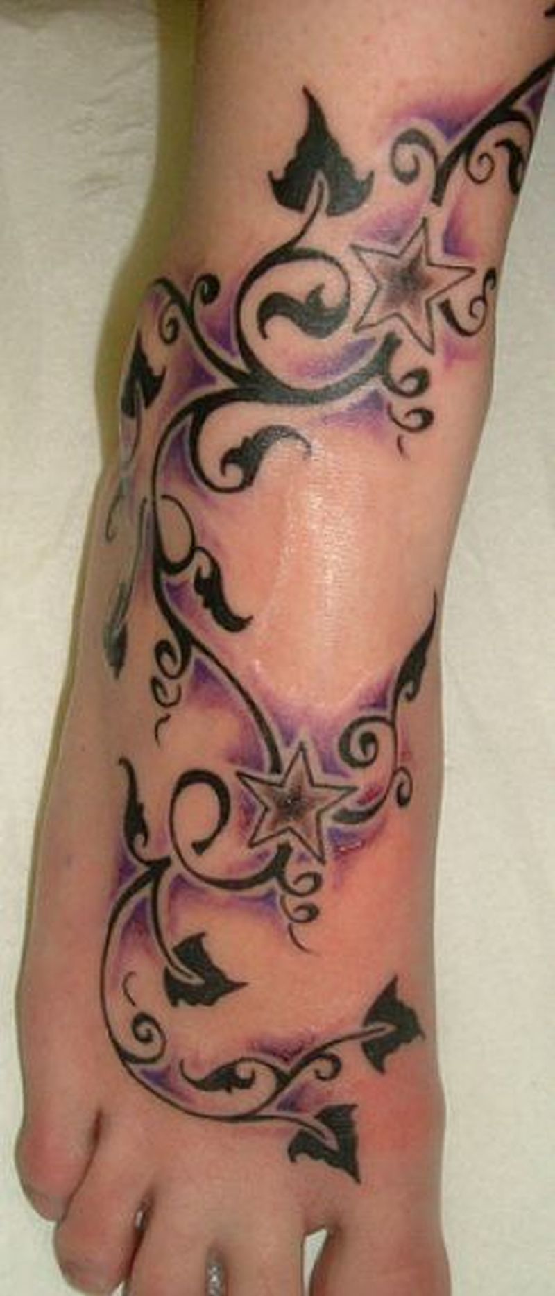 Awesome Ivy Stars Vine Tattoo On Foot