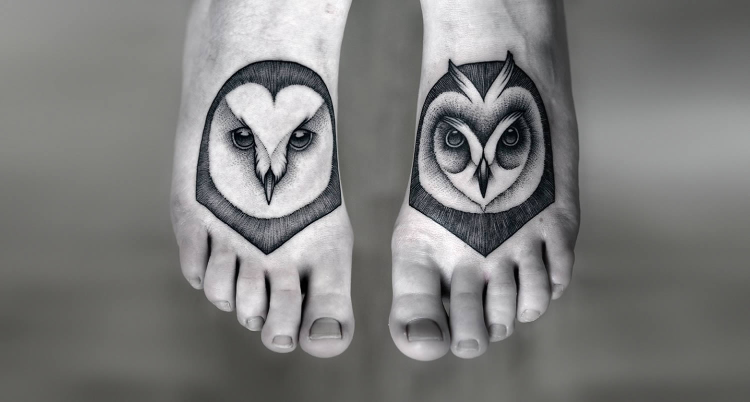 Awesome Owls Head Both Feet Tattoo By Kamil Czapiga