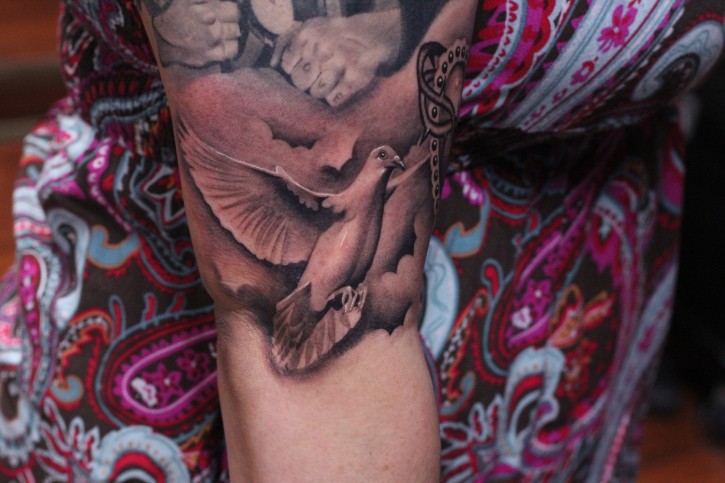 Awesome Realistic Dove Tattoo On Bicep