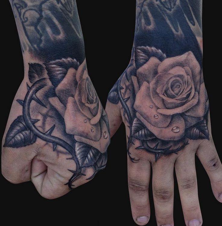 Awesome Realistic Thorny Rose Tattoo For Men Hand