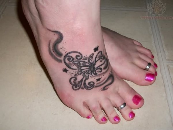 Beautiful Black Butterfly Tattoo On Woman Foot