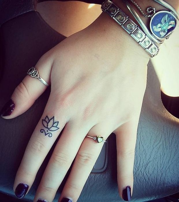Beautiful Lotus Flower Tattoo On Girl Finger