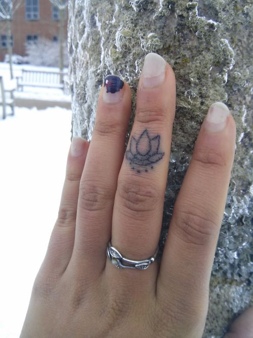 Beautiful Outline Lotus Flower Tattoo On Finger