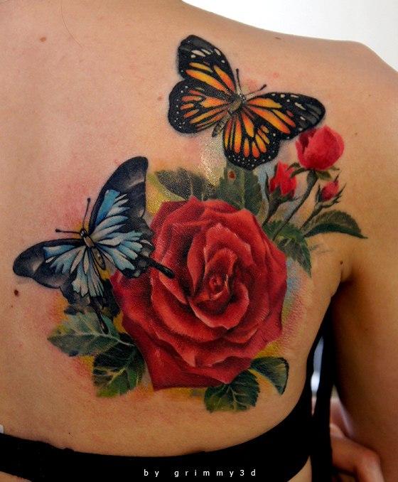 Beautiful Roses And Butterflies Tattoo On Upper Back For Women